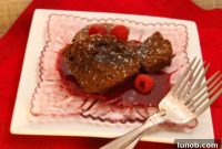 Decadent Fudgy Dark Chocolate Brownies with Bright Raspberry Sauce