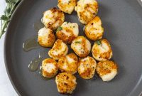 Seared Scallops Infused with Garlic and Sage
