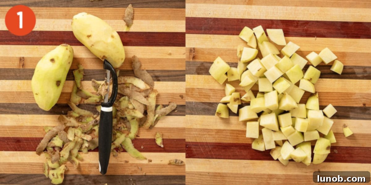 Peeled and chopped russet potatoes, ready for cooking.