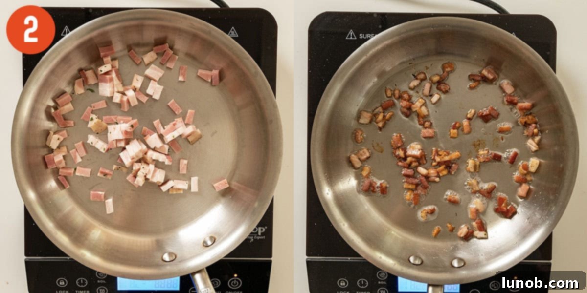 Crispy pancetta frying in a large saucepan, releasing its flavorful oil.