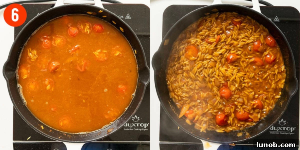 Orzo simmering gently in chicken broth within the covered saucepan, absorbing the liquid to become tender.