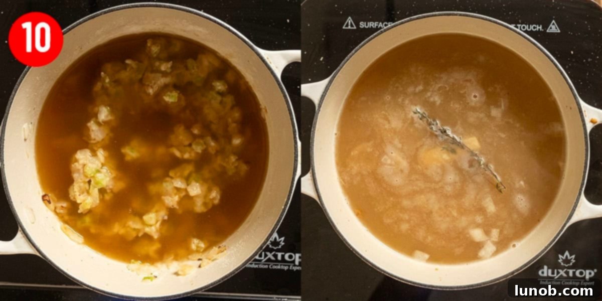 Velvet Clam Delight 9 Chicken stock and clam broth simmering in a Dutch oven, forming the base of the chowder.