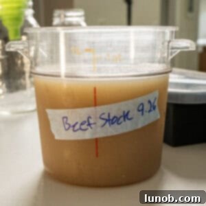Beef stock in a container.