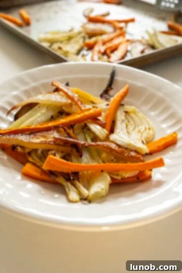 Sweet and Earthy Roasted Carrots and Fennel 7 Pear, carrots, and fennel in a bowl.