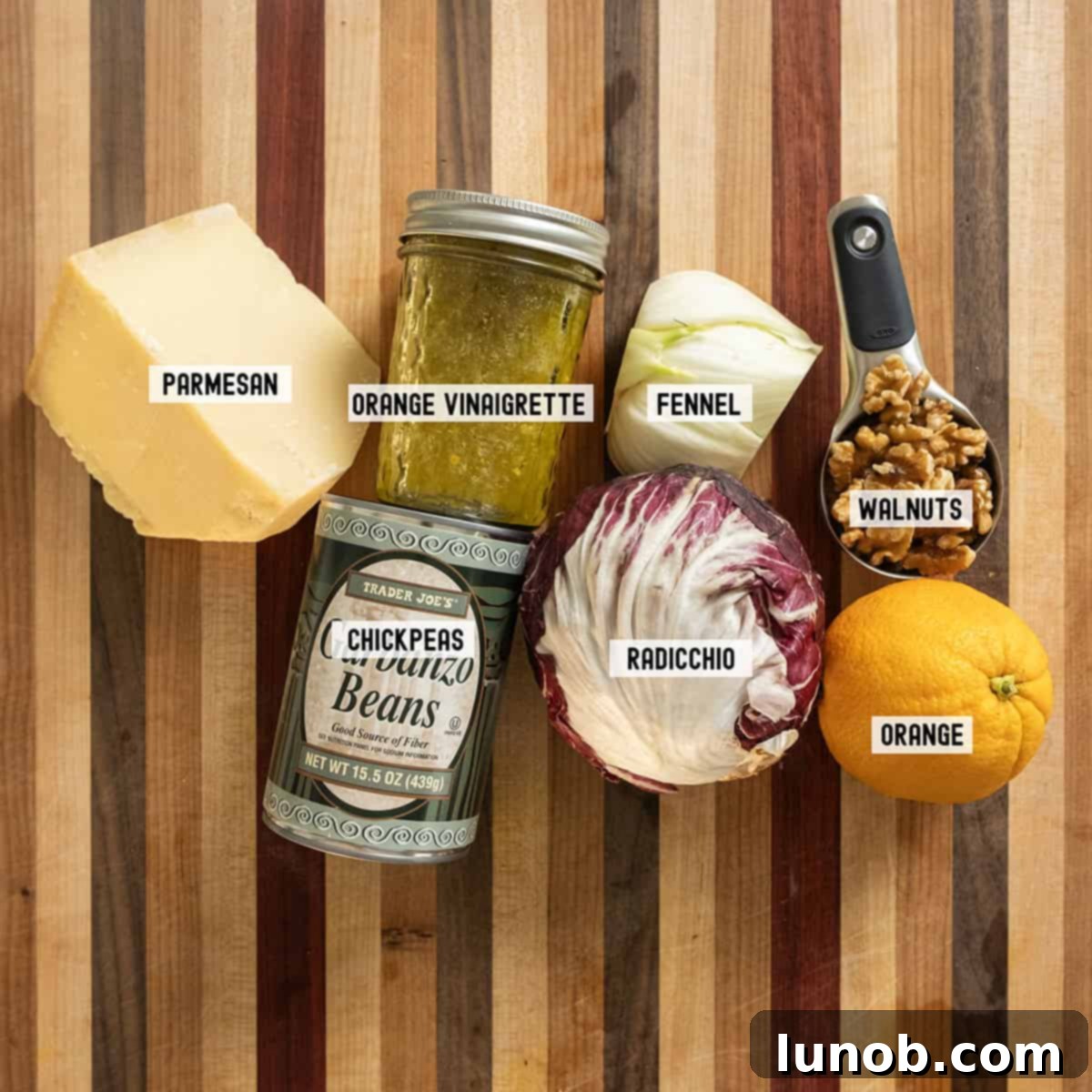 Fresh ingredients for the Italian Radicchio Salad, including radicchio, fennel, oranges, chickpeas, and Parmesan.