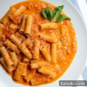 creamy red pepper sauce over rigatoni