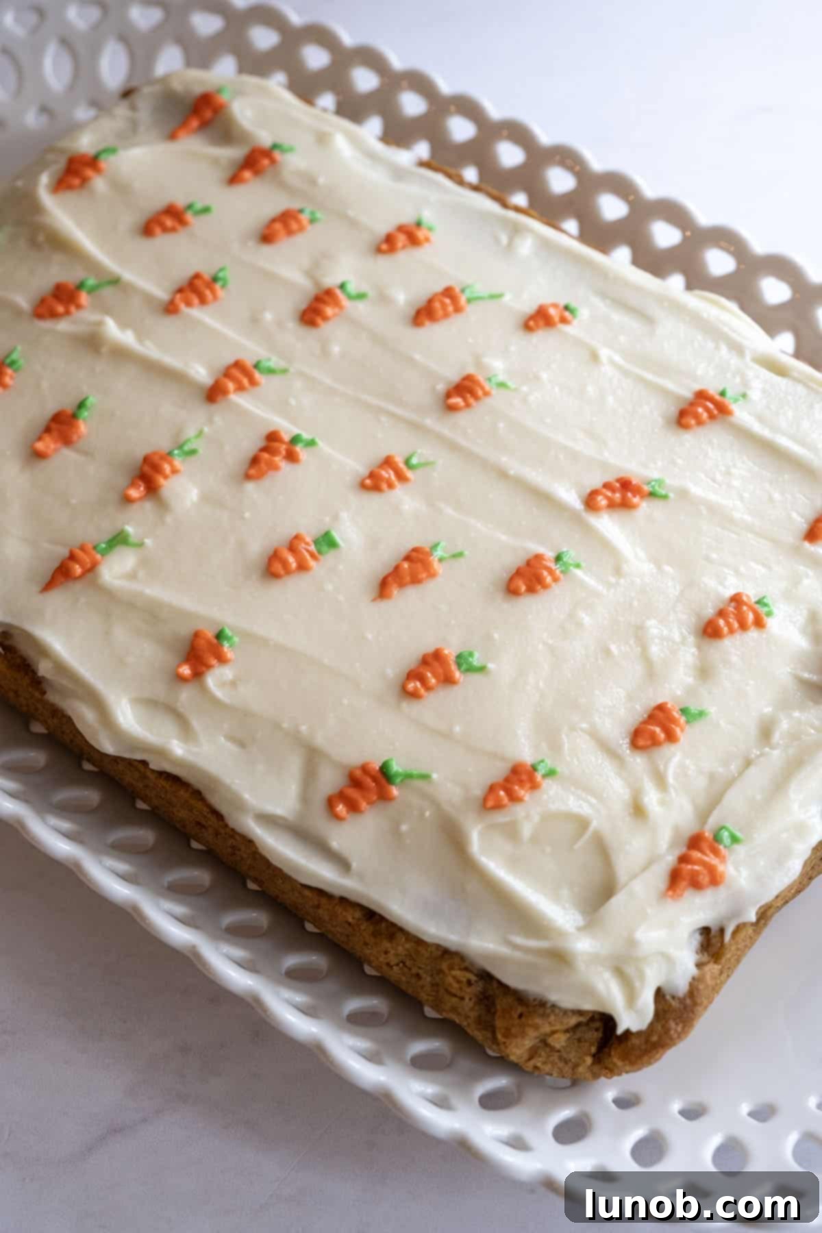carrot designs painted onto the frosted blondies