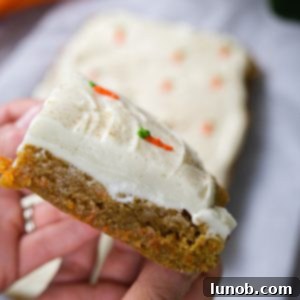 Close-up of frosted carrot cake blondies ready to eat