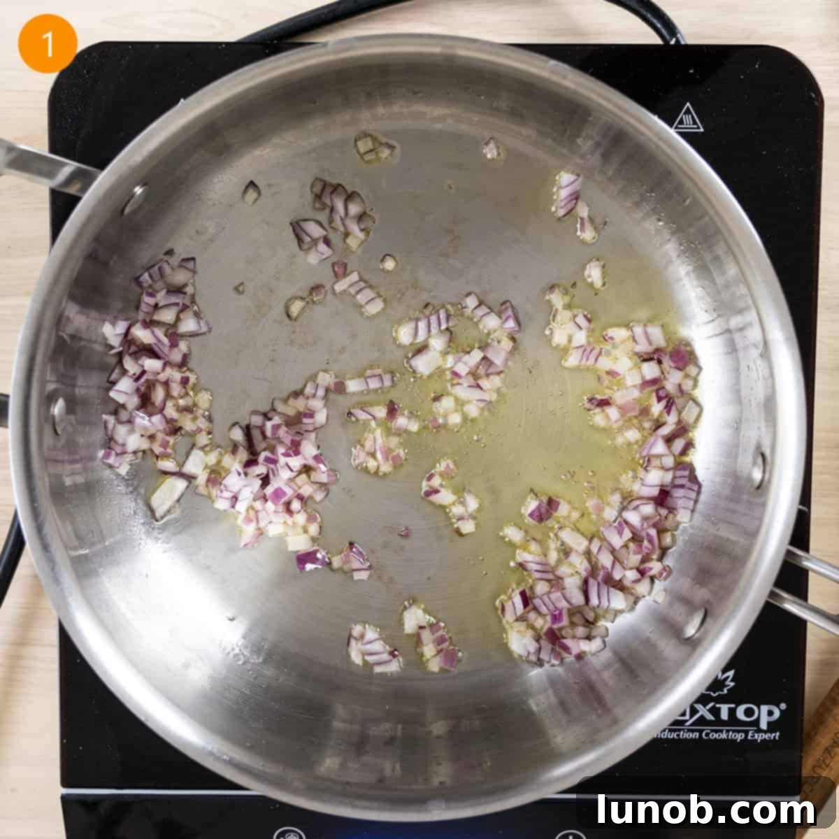 Velvety Garlic Mushroom Pasta 4 Sauteing onions in olive oil.