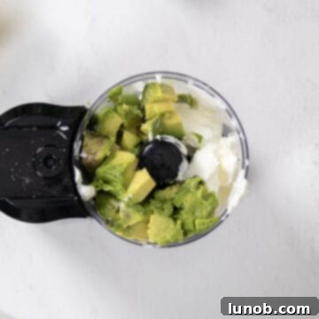 Fresh Avocado Lime Crema 6 yogurt and avocado in the food processor.