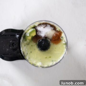 Fresh Avocado Lime Crema 8 seasonings combined with the rest of the ingredients in the food processor.