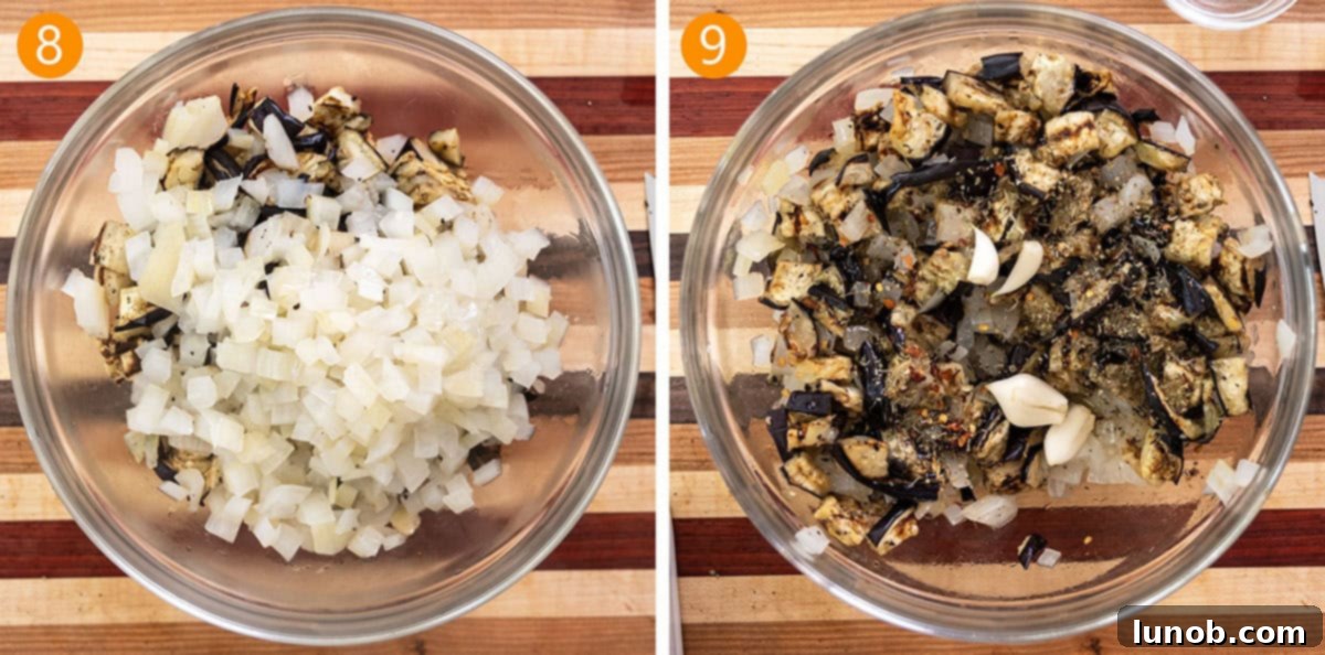 Tangy Marinated Eggplant and Onion 7 A large bowl containing chopped grilled eggplant and onions, whole garlic cloves, and various seasonings ready for the olive oil marinade.