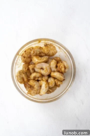 marinated shrimp in spices and olive oil ready for cooking