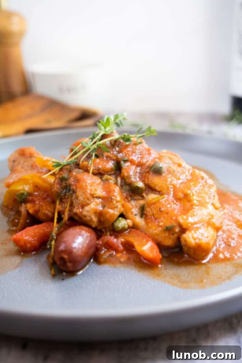 chicken cacciatore served with olives, capers, and fresh thyme