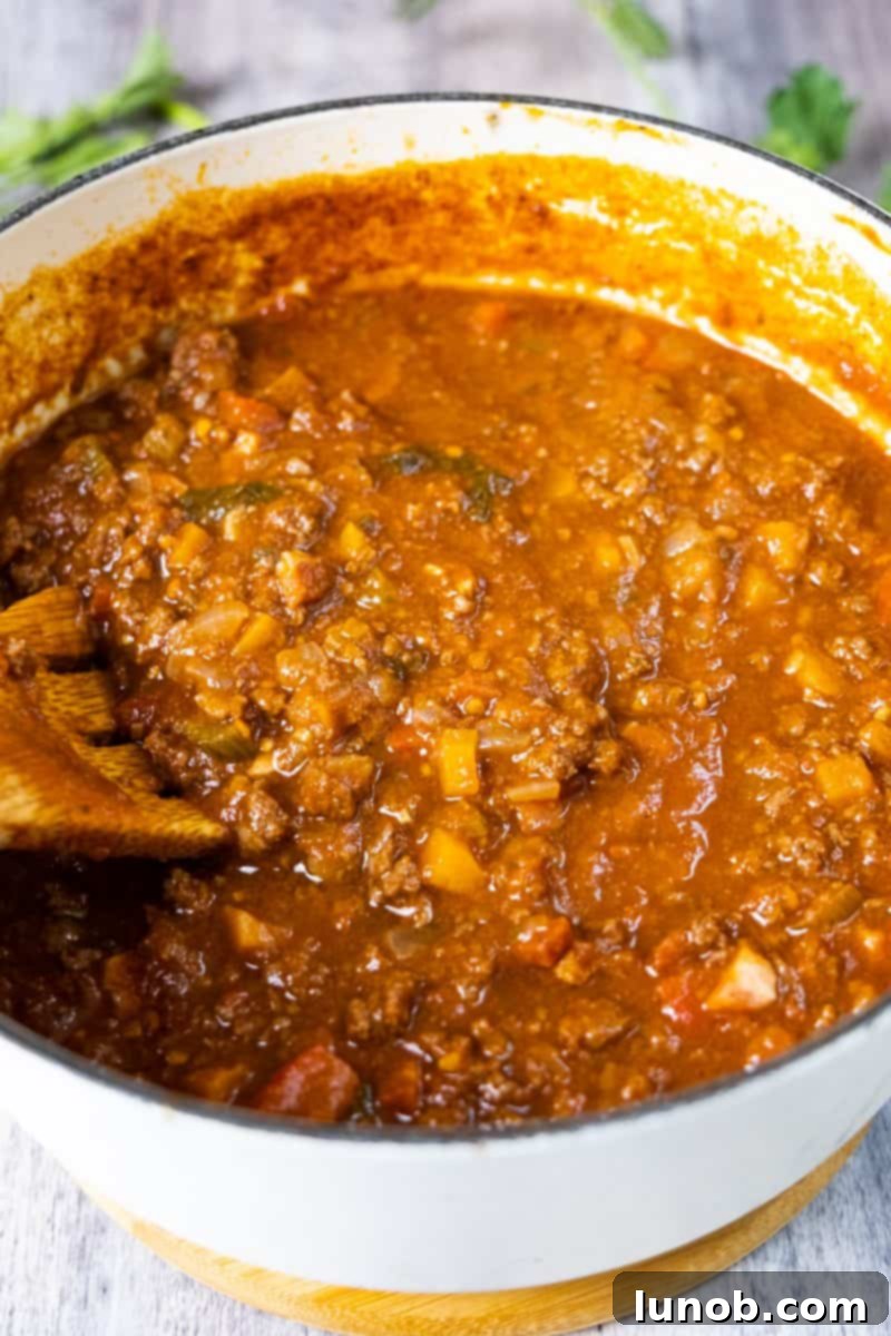 Slow-Cooked Bison Ragu 4 Bison ragu served in a Dutch oven, ready for family-style dining.