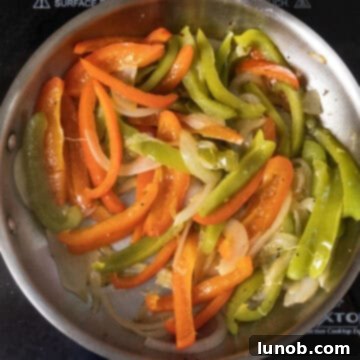 Classic Pepper & Egg Sub 7 peppers and onions softened in the frying pan after frying for 20 minutes.