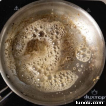 Classic Pepper & Egg Sub 8 butter added to frying pan for eggs.