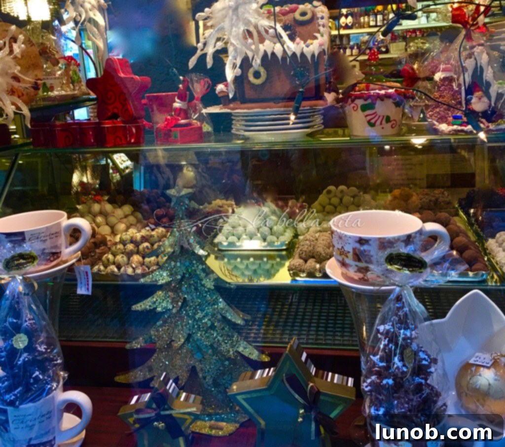 Colourful and festive Christmas decorations and gifts displayed in a Bavarian shop window