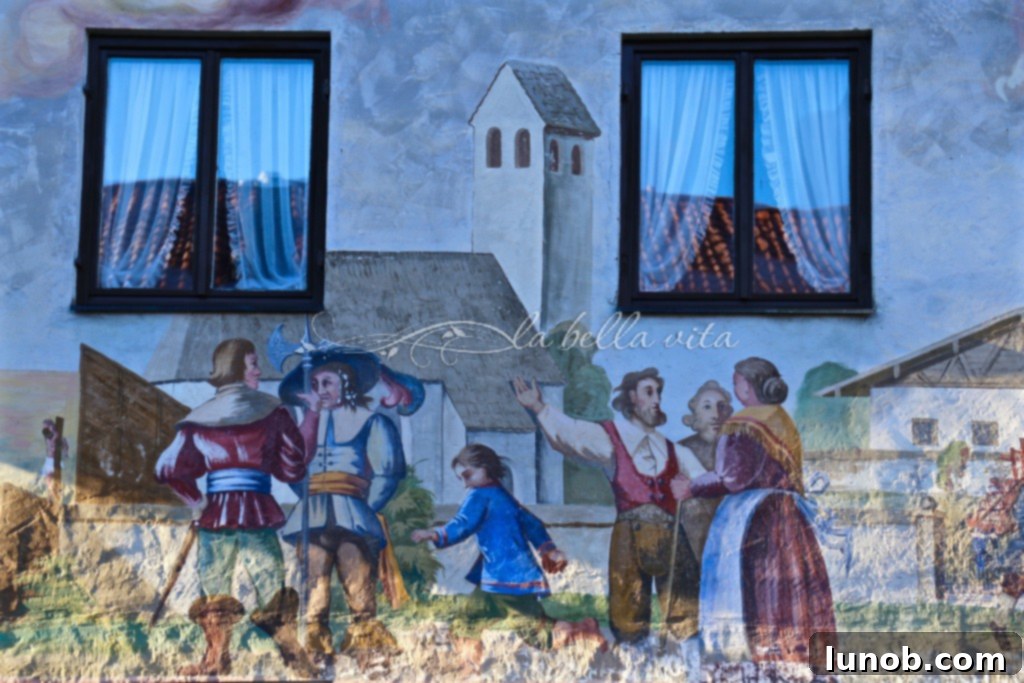 Oberammergau, Bavaria, Germany Home of The Passion Play. A mural depicting bustling daily life in the village, full of historical charm.