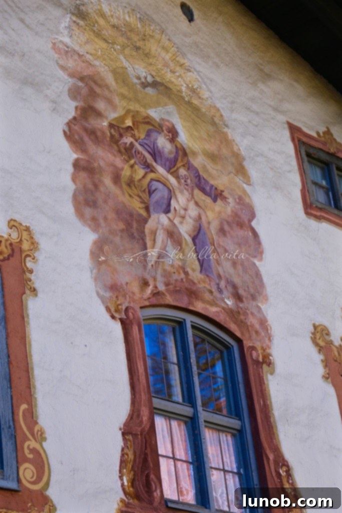 Oberammergau, Bavaria, Germany. Visual images painted on walls, historically used for teaching the Christian faith to illiterate villagers.