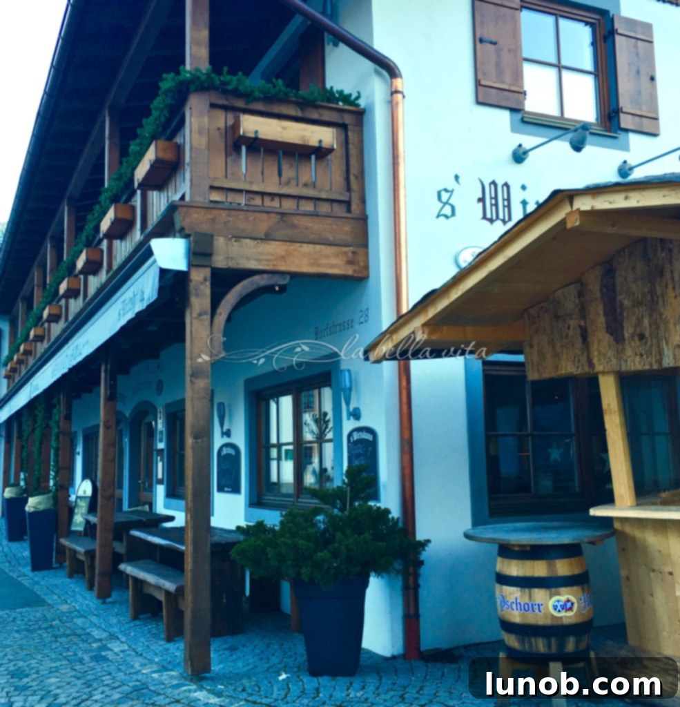 Oberammergau, Bavaria, Germany. All is quiet in the morning at a typical German tavern, showcasing traditional architecture.