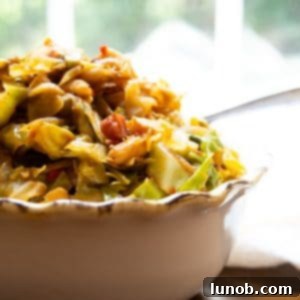 Italian cabbage with pancetta, showcasing the tender cabbage, crispy pancetta, and creamy cannellini beans