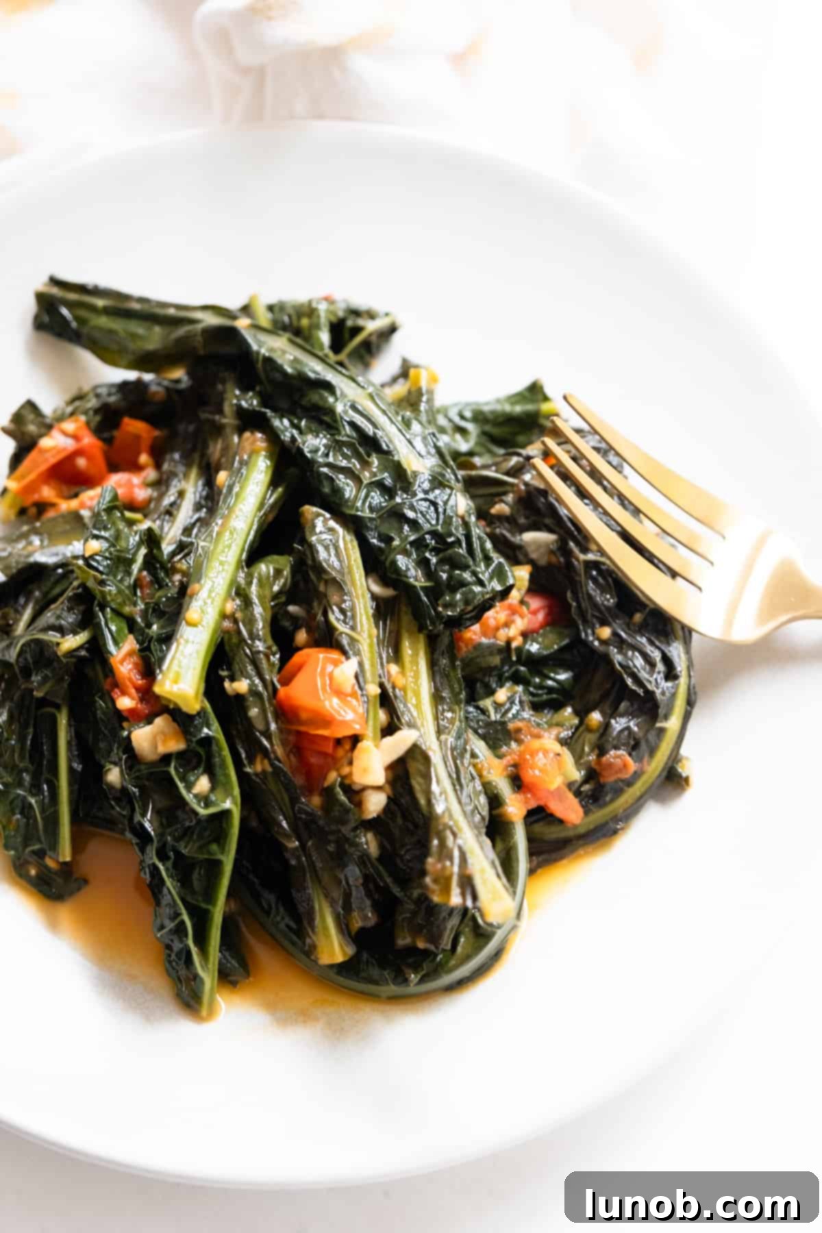 finished lacinato kale recipe braised with cherry tomatoes and garlic