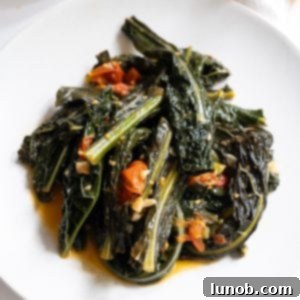 finished lacinato kale recipe braised with cherry tomatoes and garlic