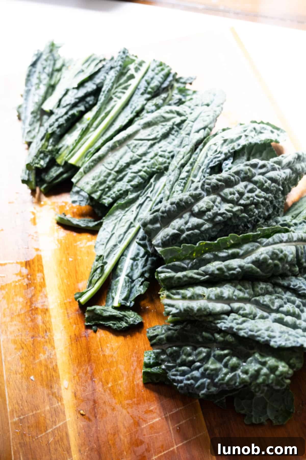 the lacinato kale shown prepared by cutting in half cross length