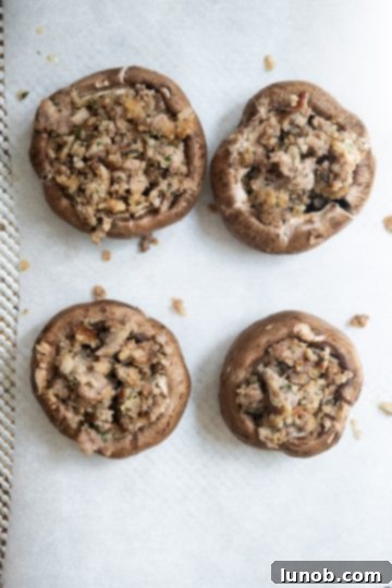 Gourmet Italian Stuffed Portobello Bake 6 mushrooms stuffed with sausage