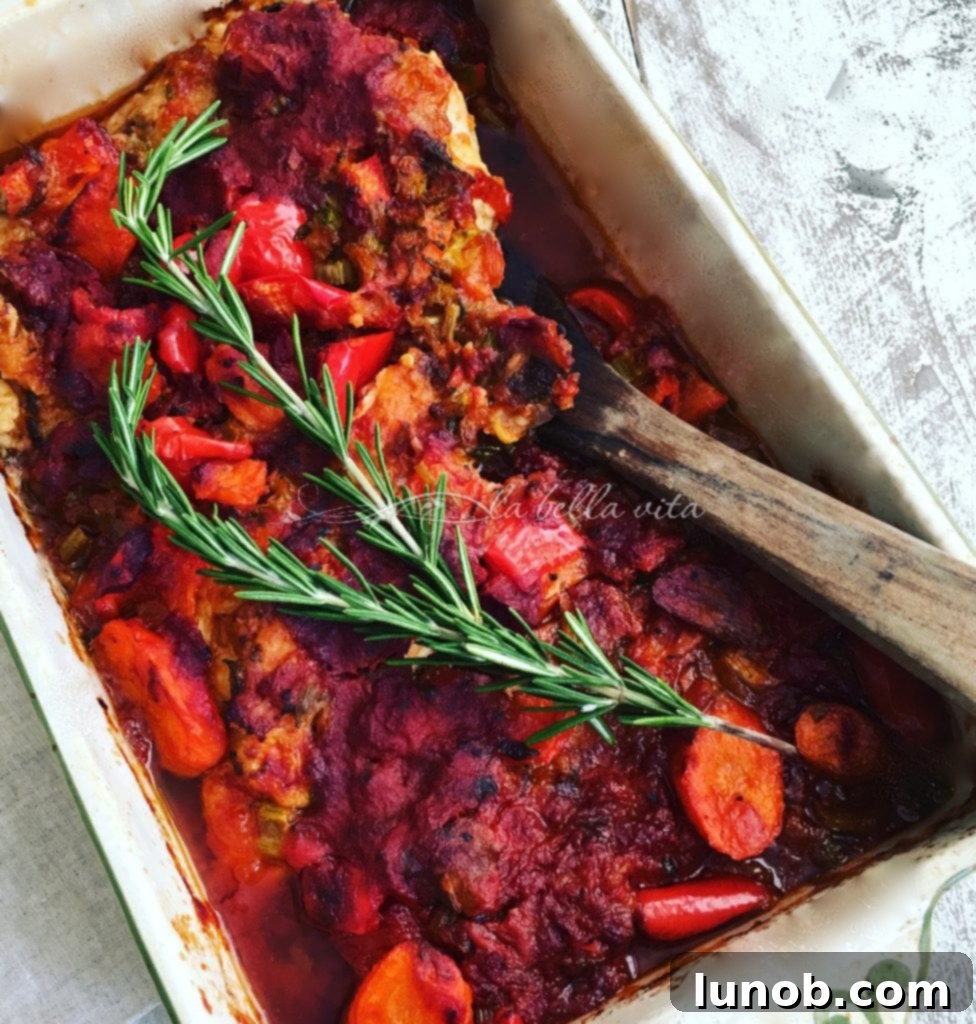 Classic Chicken Cacciatore Pollo alla Cacciatore simmering in a pan