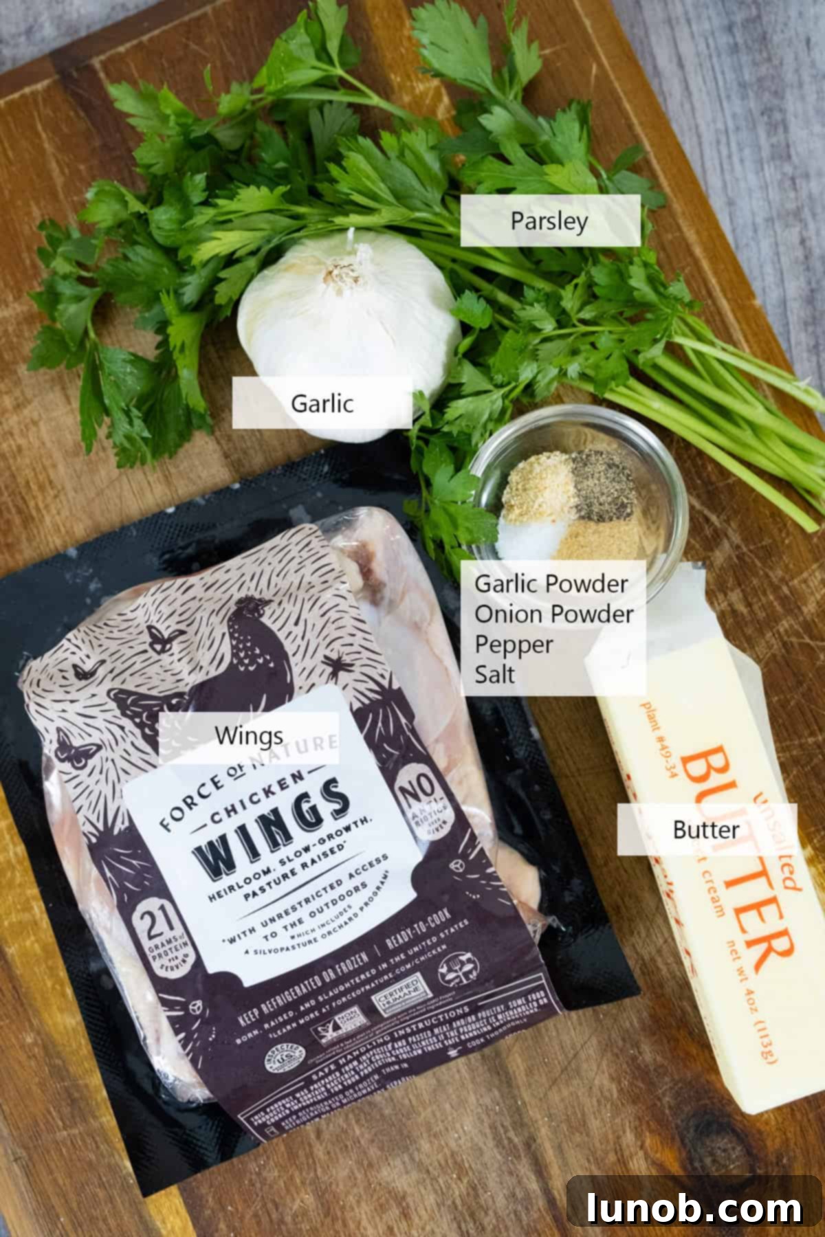 Crispy Air Fryer Garlic Parmesan Wings 3 Ingredients for making air fryer garlic parmesan wings, neatly arranged