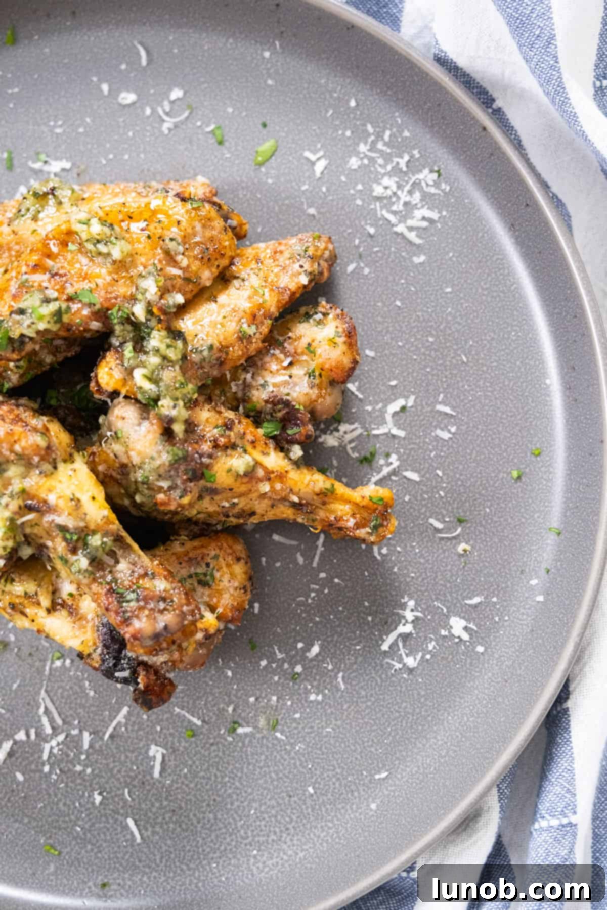 Crispy Air Fryer Garlic Parmesan Wings 8 Close-up shot of perfectly cooked air fryer garlic parm wings ready to serve