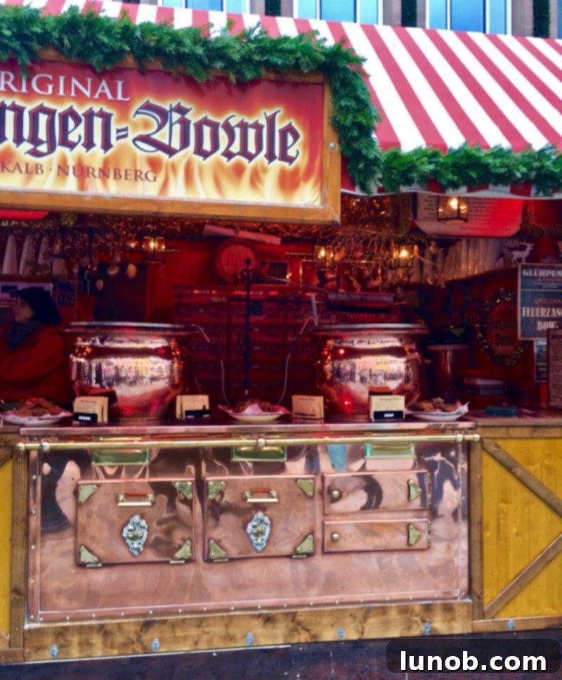 Gluhwein German Mulled Wine Munich Nuremberg Tradition 10 Large copper cauldrons of simmering Glühwein at a market stall