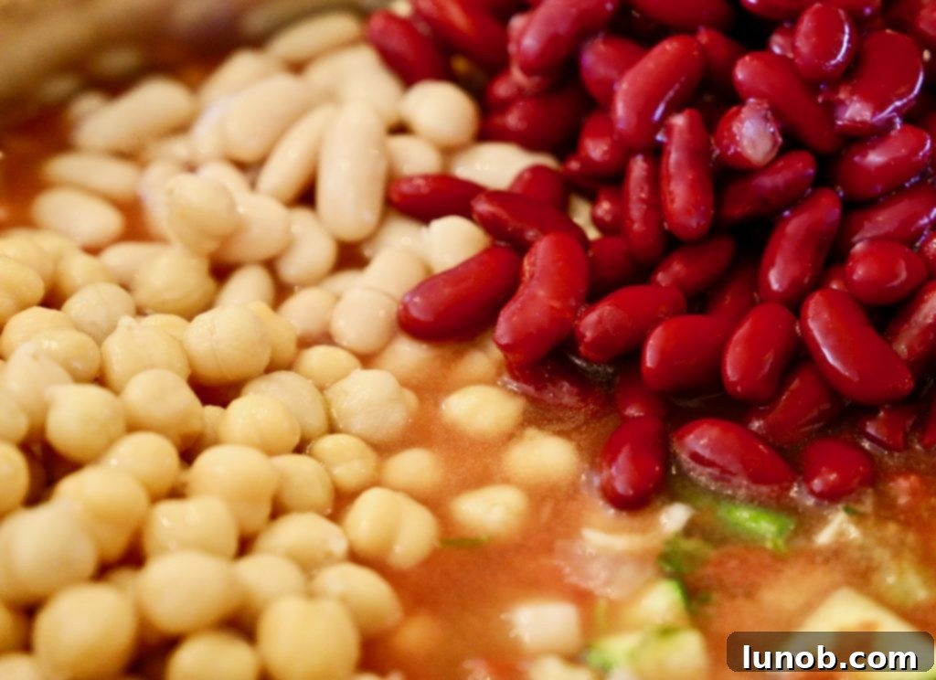 Authentic Italian Minestrone: The Definitive Classic Recipe 17 Adding a Parmesan cheese rind and fresh sage before filling the Instant Pot with broth.