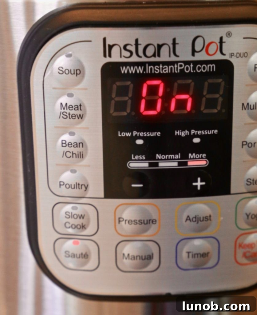 Authentic Italian Minestrone: The Definitive Classic Recipe 3 Pouring olive oil and adding butter to the Instant Pot for minestrone base.