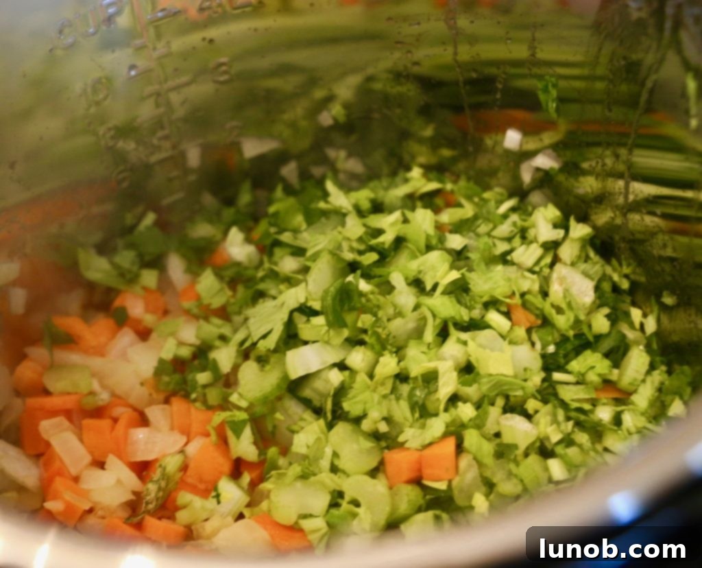 Authentic Italian Minestrone: The Definitive Classic Recipe 7 Incorporating diced pancetta into the sautéing vegetables for added depth in minestrone.