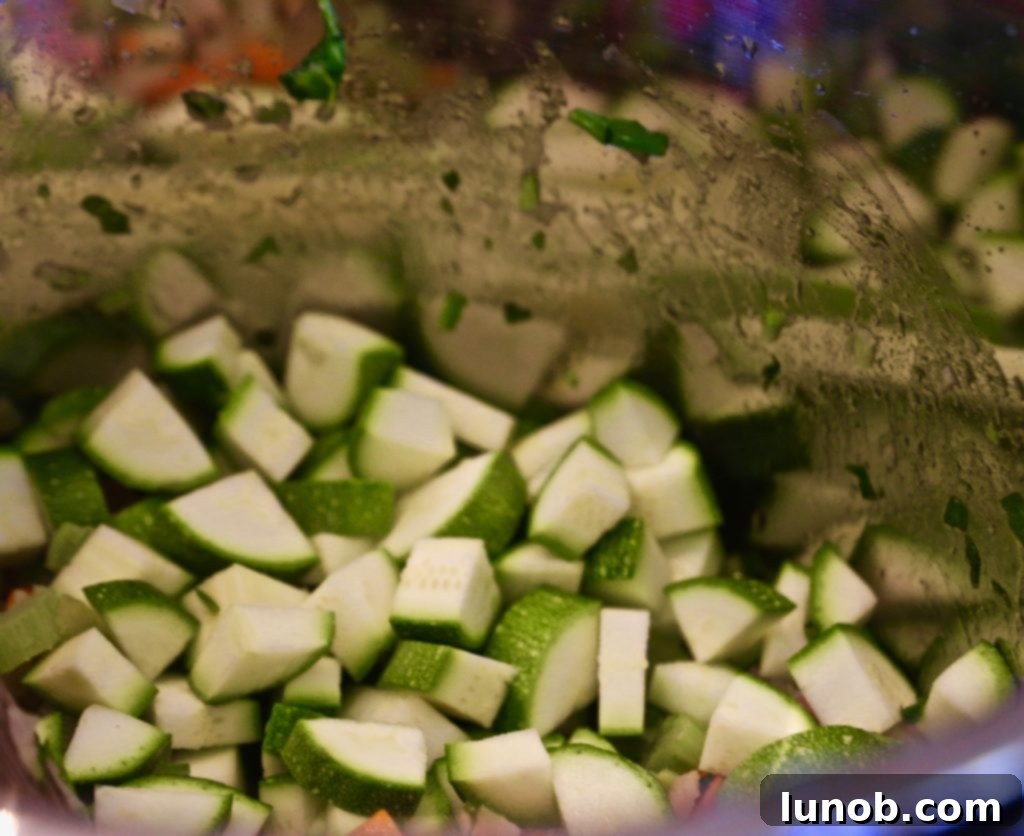 Authentic Italian Minestrone: The Definitive Classic Recipe 10 Adding fresh green beans to the Minestrone soup mixture.