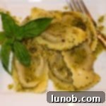 Thumbnail of wild mushroom agnolotti with basil pesto butter sauce