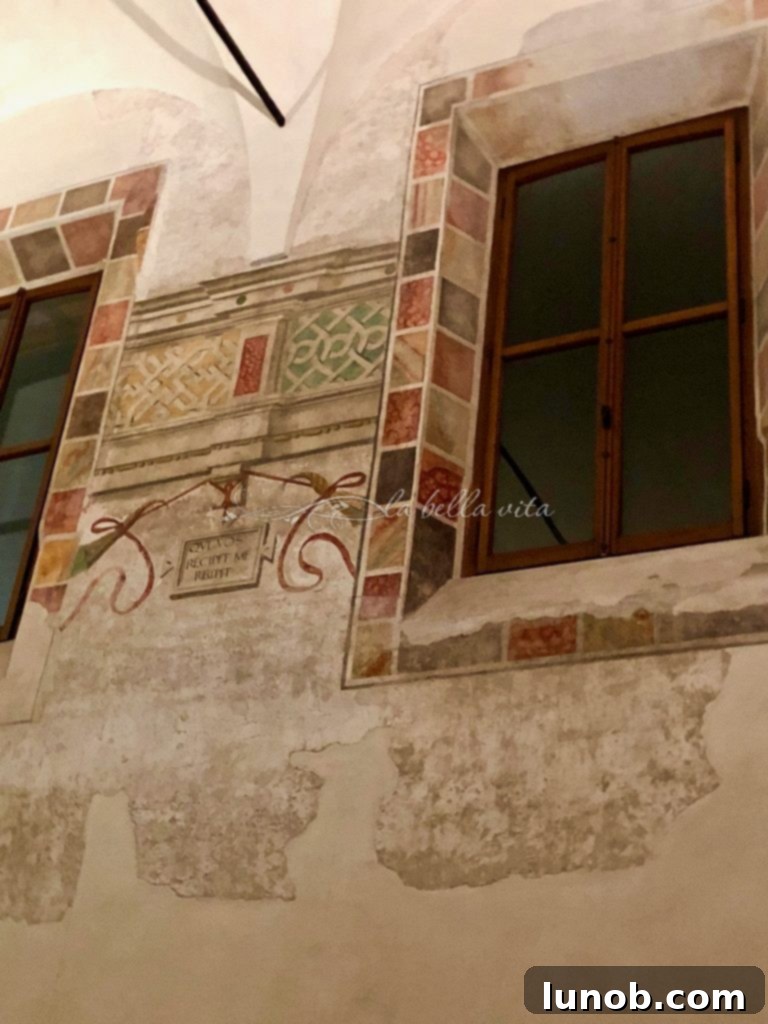 Remains of original artwork on a wall left after WWII bombing