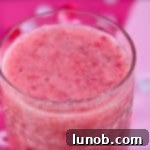 Vibrant and healthy strawberry, banana, and pineapple smoothie