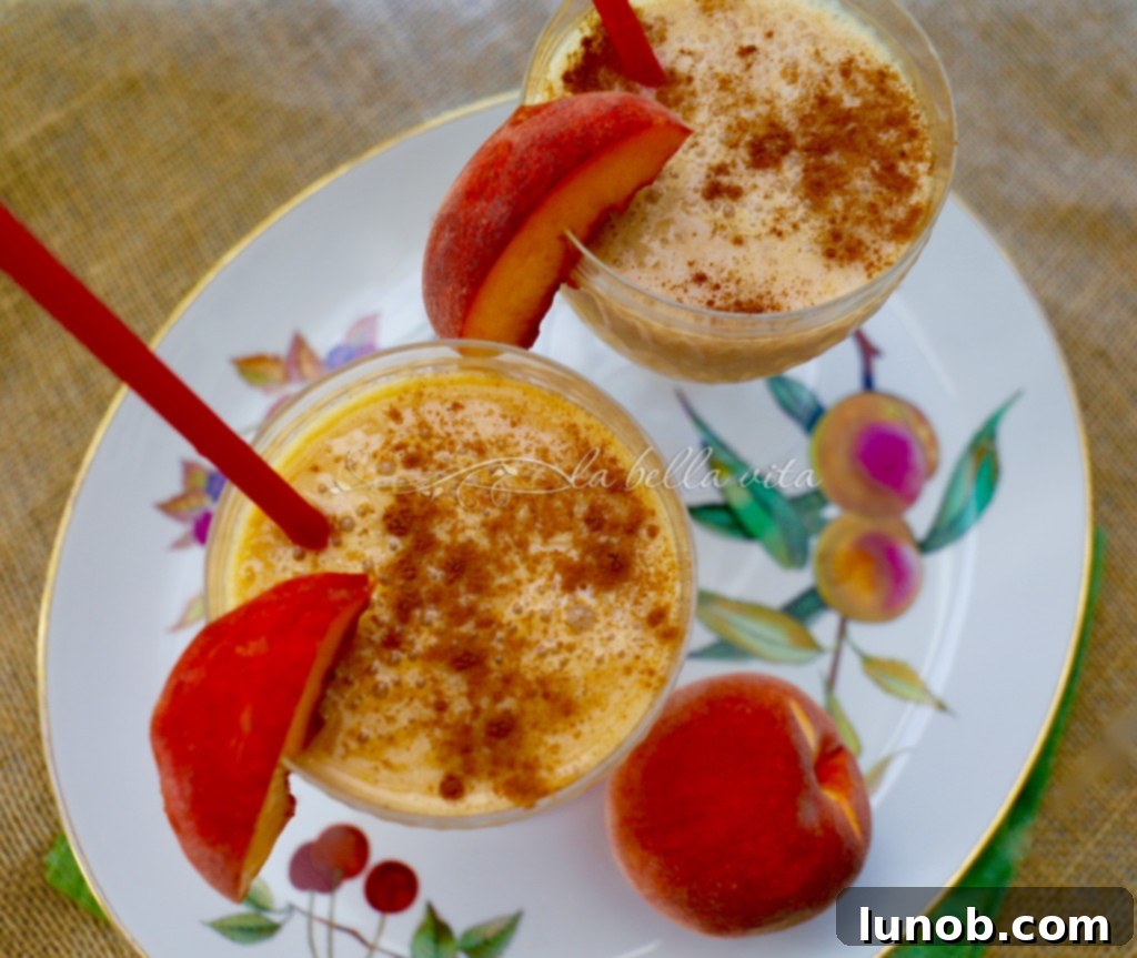 Warm and comforting Cinnamon and Spice Peach Almond Smoothie, perfect for a cozy treat.