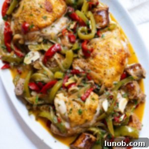 Homemade Restaurant-Style Chicken Scarpariello Perfection 13 chicken scarpariello sitting on a plate with its braised juices