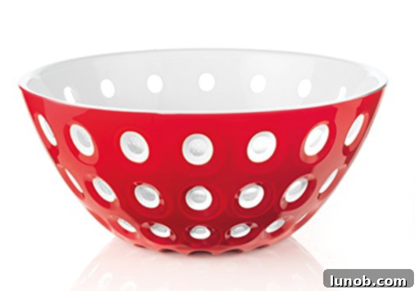 Celebrate Italian Flavors: Holiday Gifts for the Foodie 11 Guzzini Red Transparent Glass Serving Bowl with modern Italian design