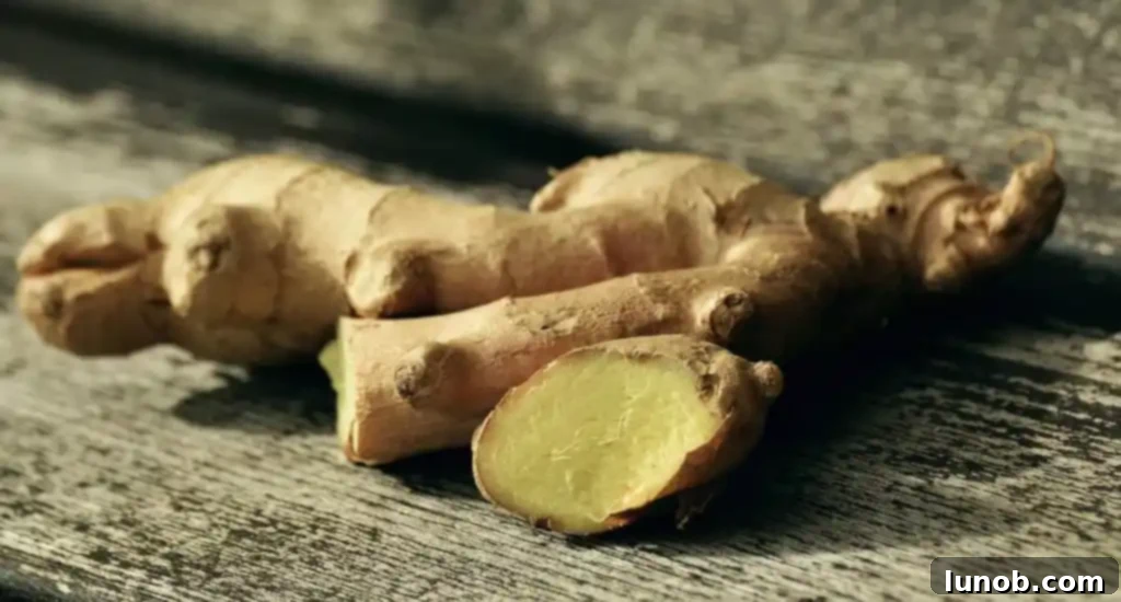 Fresh ginger root, known for its powerful detox and anti-inflammatory properties.