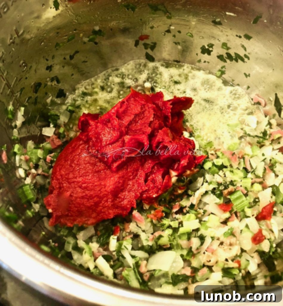 Instant Pot Hearty Pasta e Fagioli Soup 8 Adding Mutti Tomato Paste to Instant Pot Soup