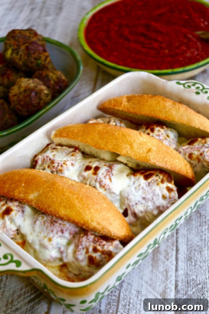 Winning Game Day Eats For Every Fan 10 Classic Cheesy Italian Meatball Sandwich on a toasted bun.