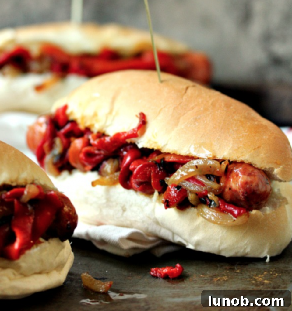 Winning Game Day Eats For Every Fan 12 Grilled Italian sausage with sautéed peppers and onions on a bun.