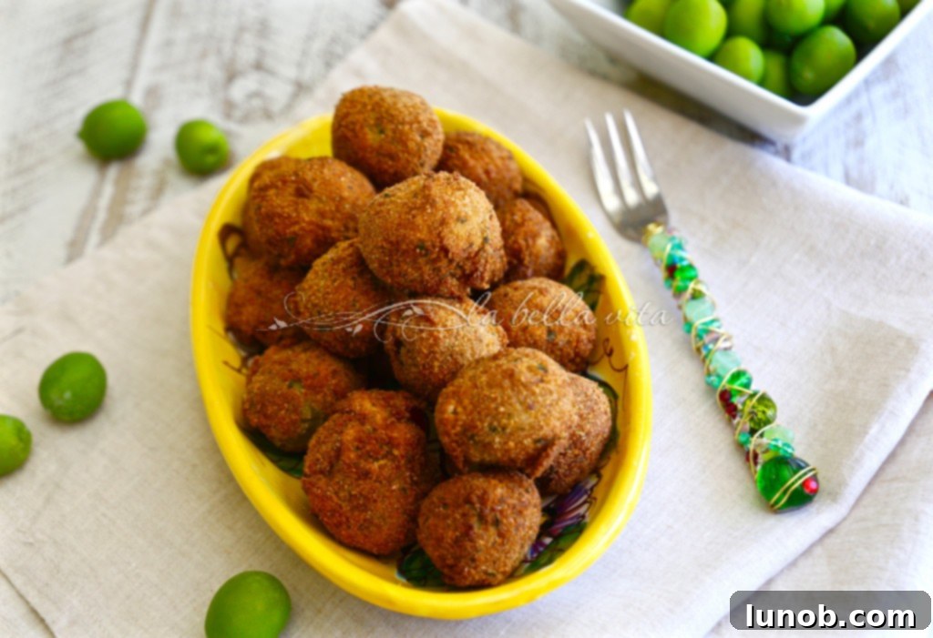 Winning Game Day Eats For Every Fan 18 Golden-fried Italian stuffed olives (Olive all'Ascolana) on a platter.