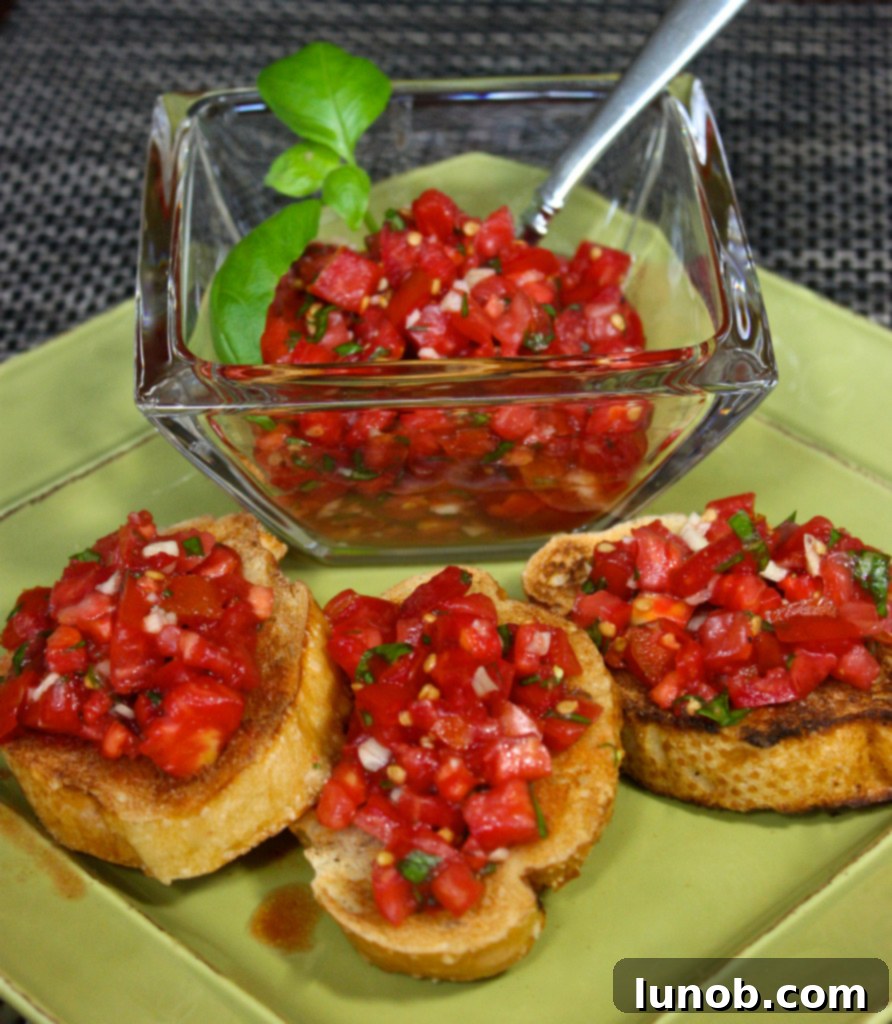 Winning Game Day Eats For Every Fan 3 Toasted bread topped with fresh diced tomatoes, basil, and garlic for a classic bruschetta appetizer.